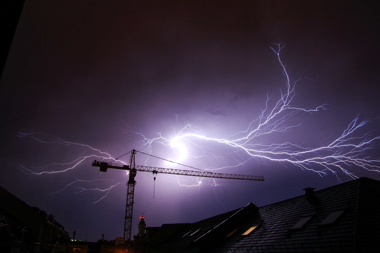 A thunderstorm above rooftops
